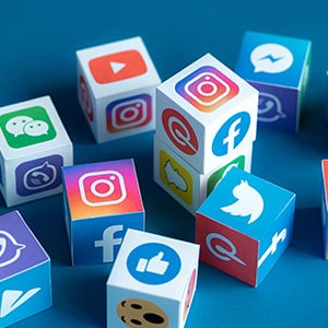 Social media icons on cubes - Leep Tescher Helfman and Zanze
