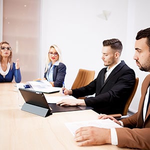 A group of people in a meeting room - Leep Tescher Helfman and Zanze
