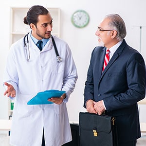 A persona and a lawyer having a discussion - Leep Tescher Helfman and Zanze