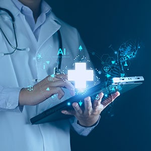 A doctor is using a tablet - Leep Tescher Helfman and Zanze